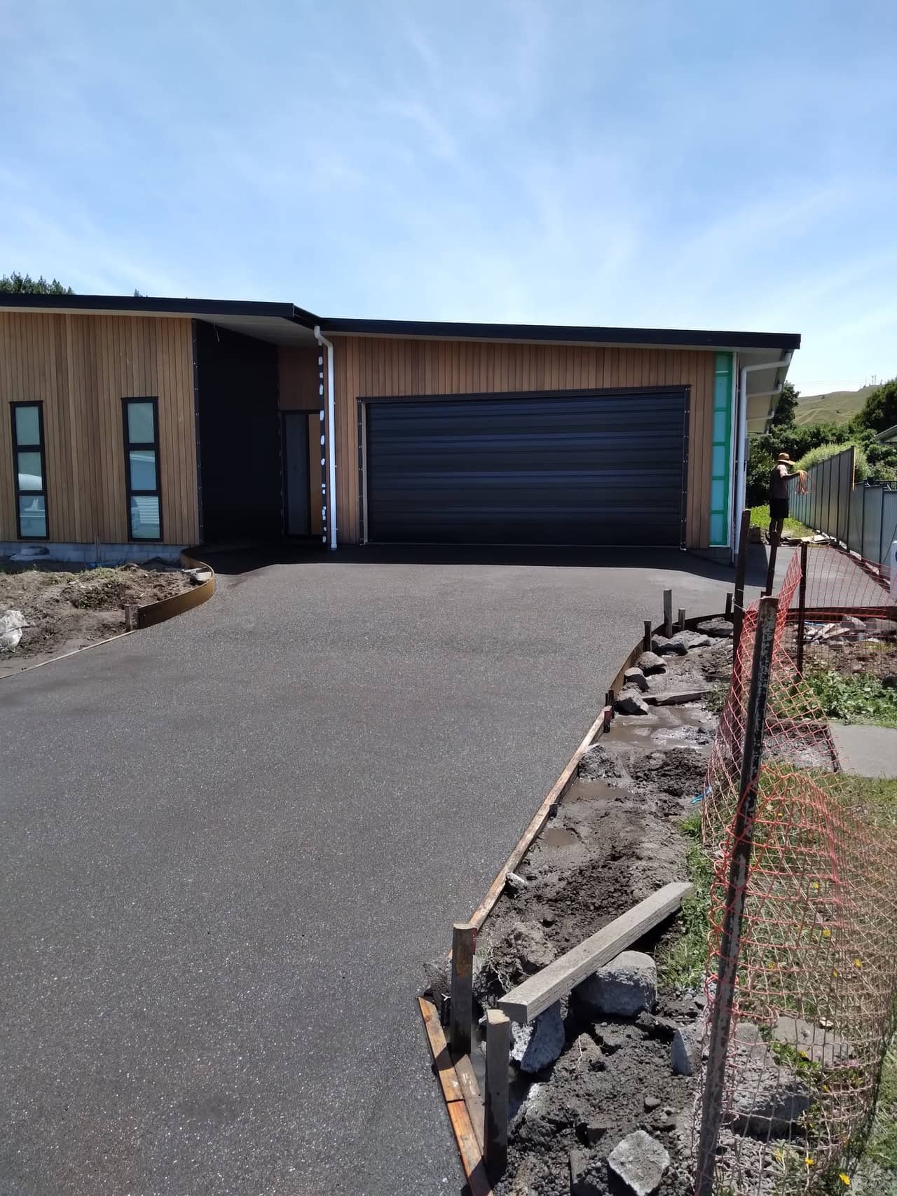 Exposed aggregate concrete driveway at a new build home in Gisborne — real Eastcrete Solutions work